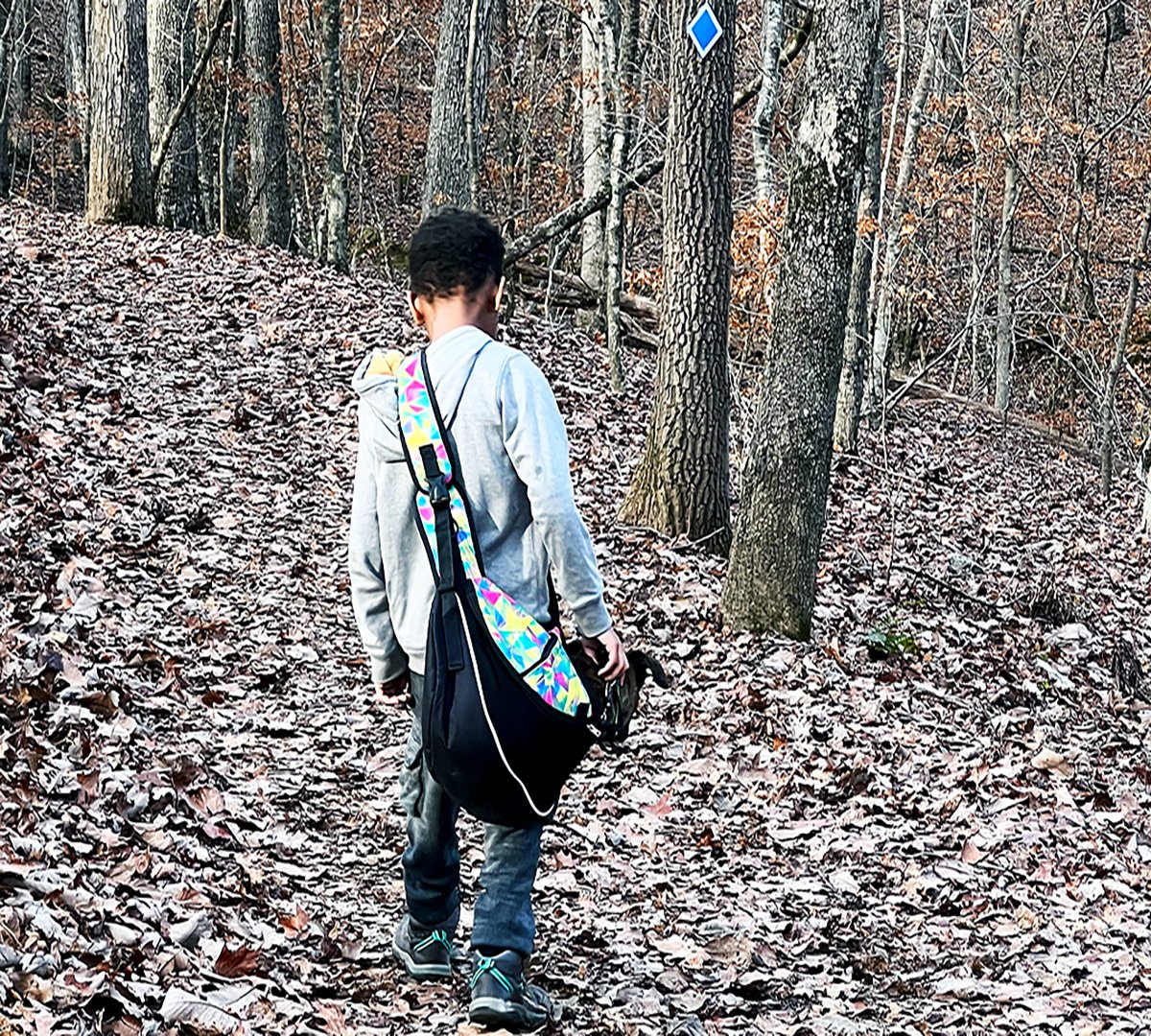 JJ walking Gabe on his leash at Leesburg Landing